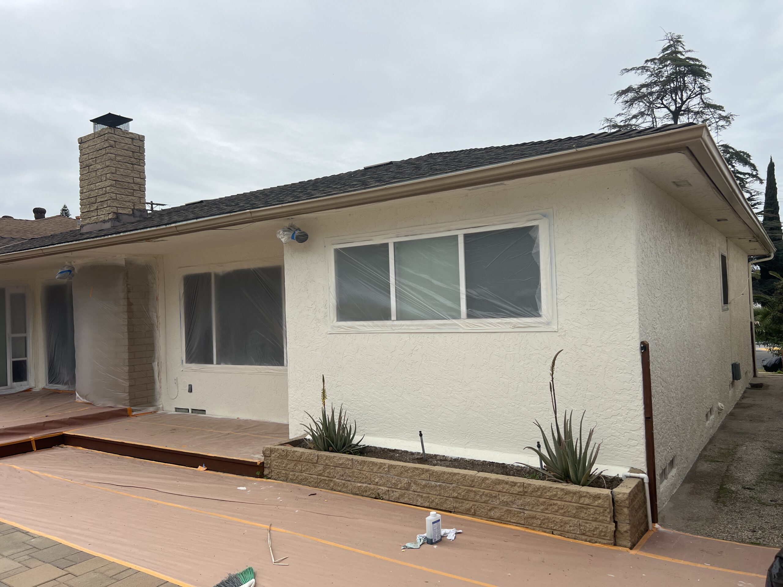 Exterior home painting in San Diego with fresh neutral tones and clean trim lines.