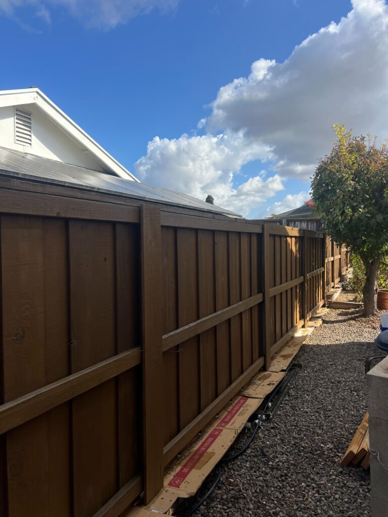 Wood fence staining in San Diego by Monarch Painting using premium weather-resistant stain